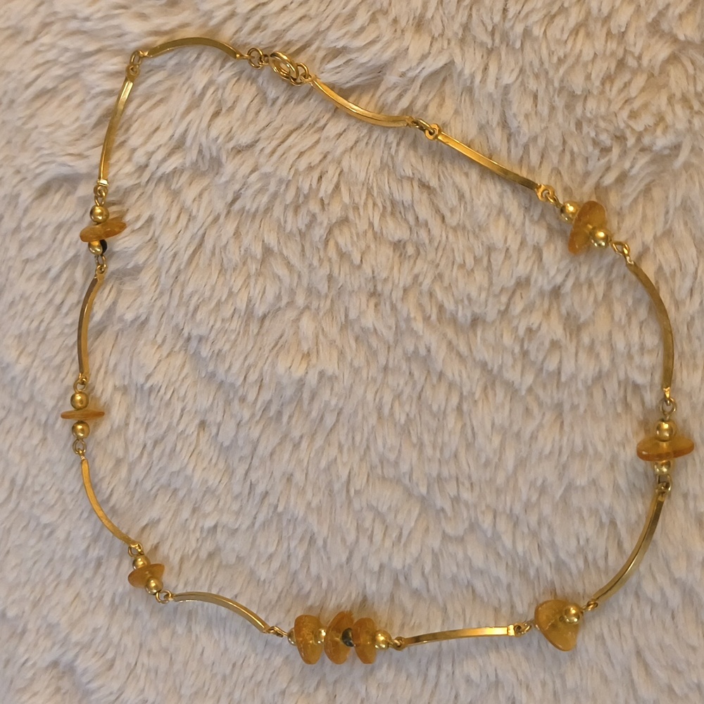 Vintage golden necklace with glass beads
